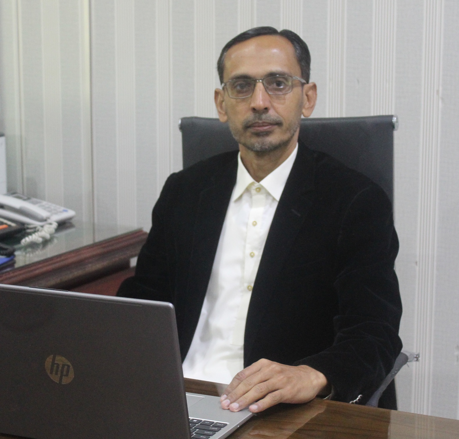 zhussain@quest.edu.pk